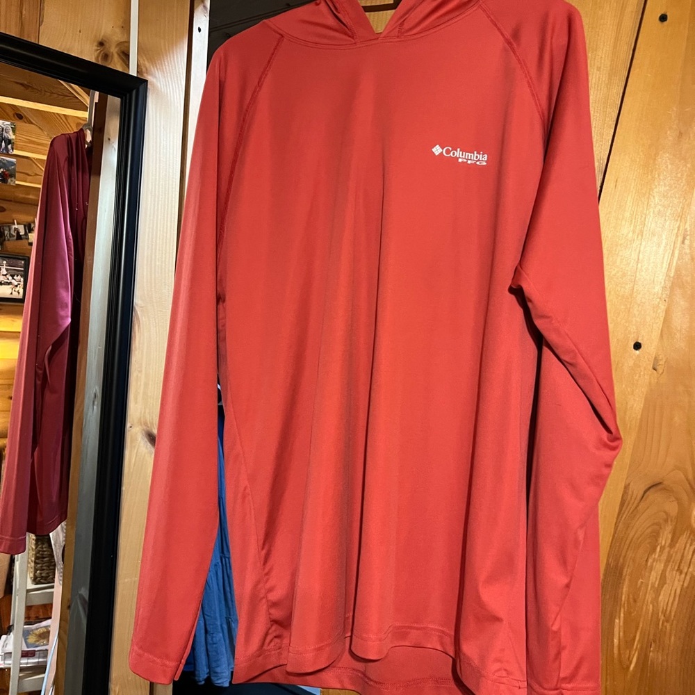 Long sleeve pink Columbia shirt with hood.